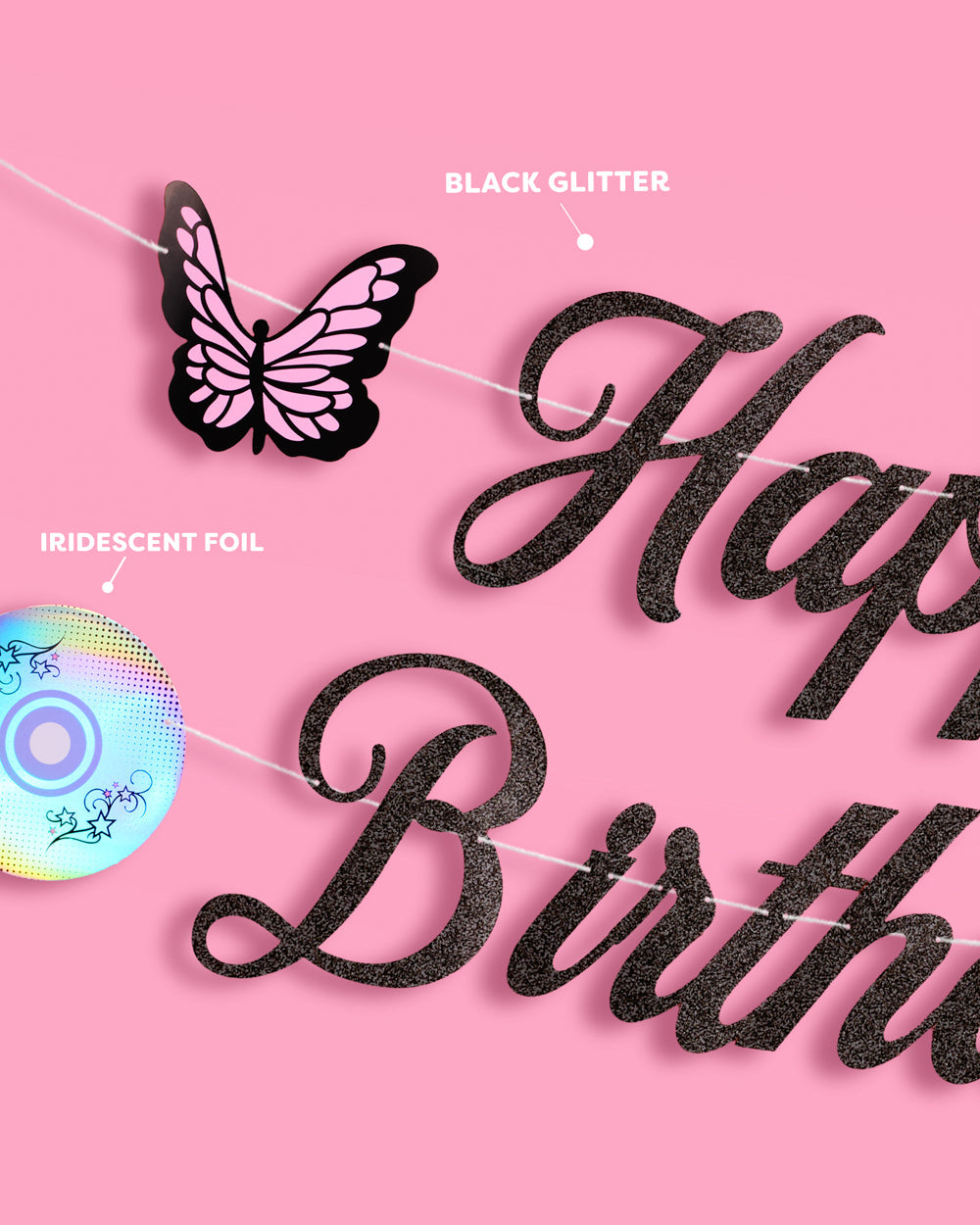 Detail of black glitter lettering and an iridescent foil CD on the Y2K bundle banner