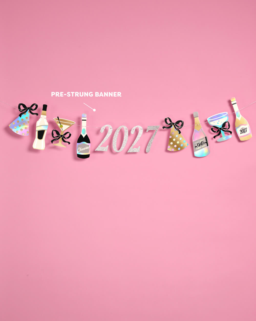 Pre-strung 2027 New Year banner with bottles, glasses, and party hats against a pink background.