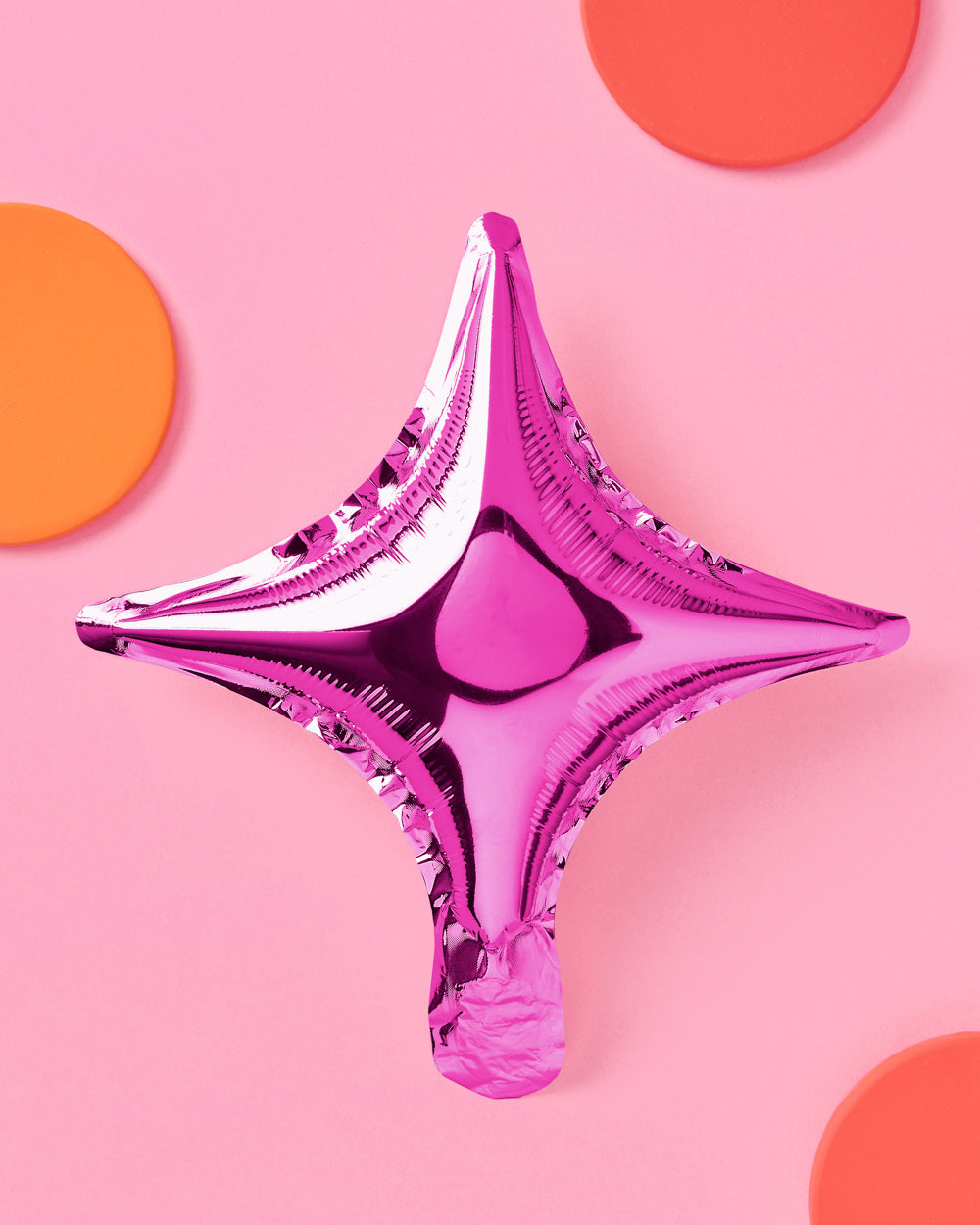Pink and silver sparkle foil balloons close up