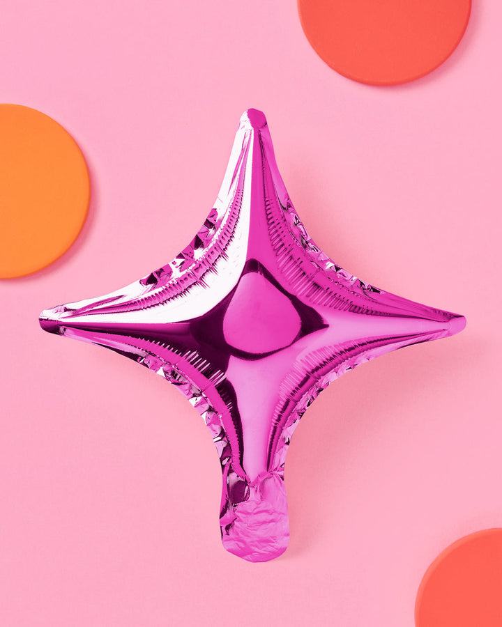 Pink and silver sparkle foil balloons close up