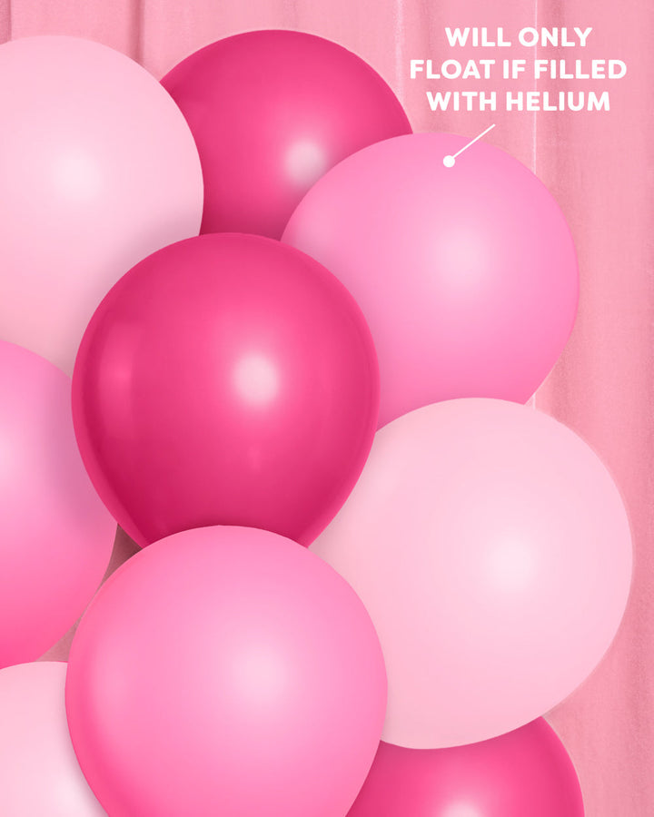 Pink balloon garland styled at a party