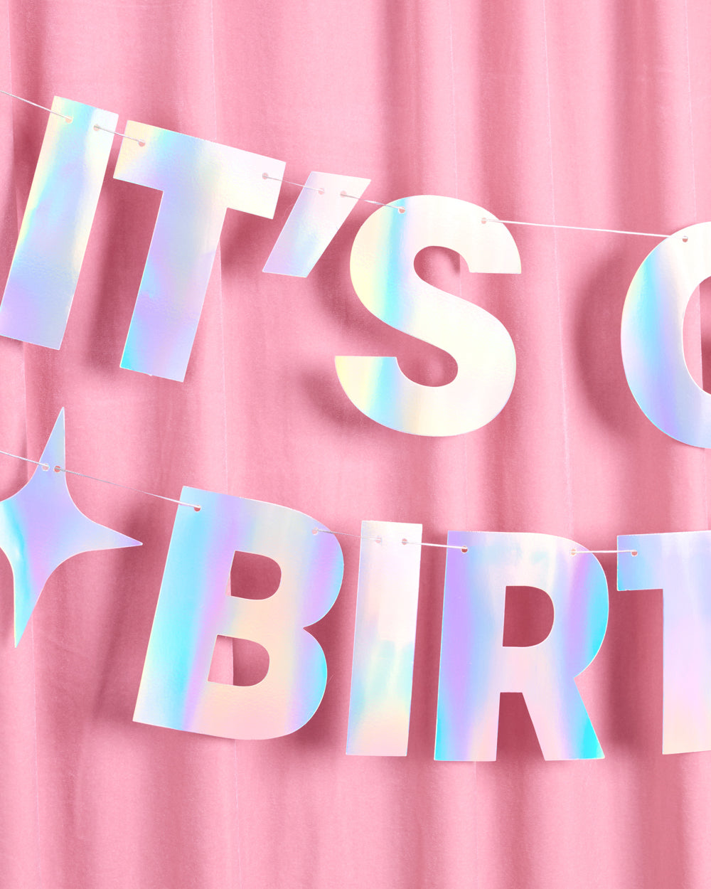 It's Giving Birthday banner strung across two lines with star accents