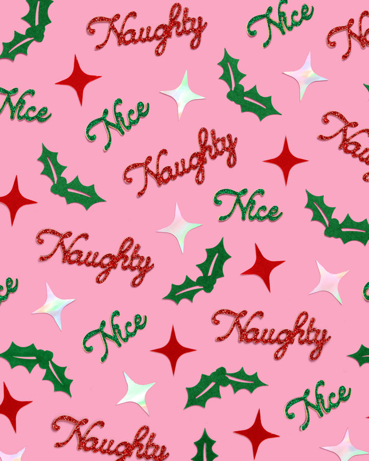 Red, green, and silver Naughty or Nice confetti mix with star and holly shapes