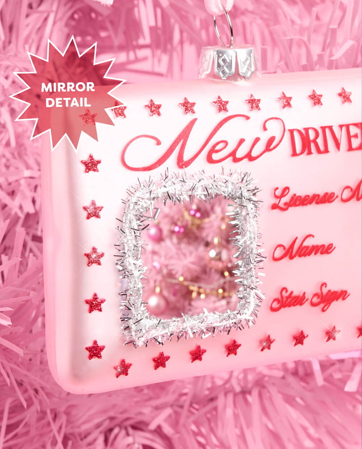 Another view of the New Driver ornament, showing the glittered silver photo square on the pink license design.
