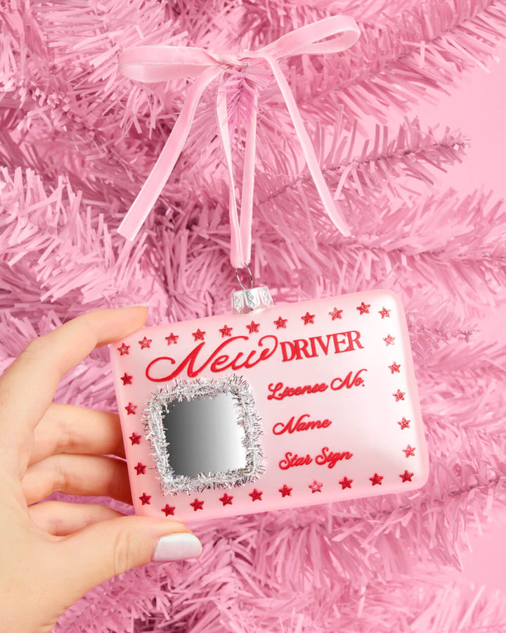 Additional view of the pink New Driver license ornament and its pink ribbon loop.
