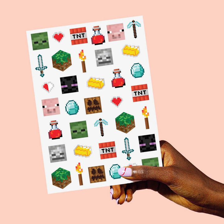 Pixel mining gamer temporary tattoo sheets by xo Fetti with pixel blocks, TNT, swords, and mob faces