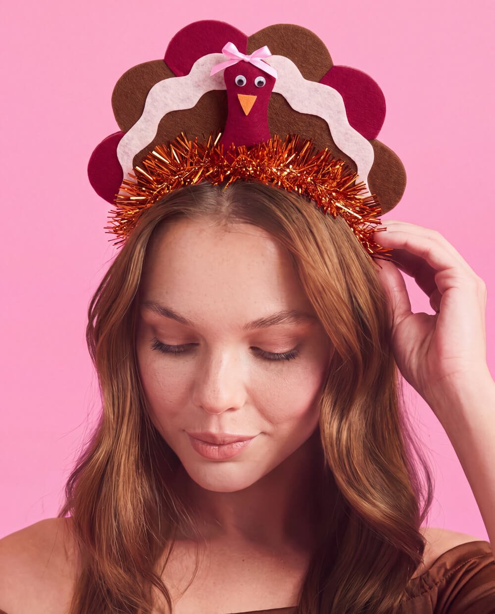 Woman wearing the felt turkey Thanksgiving headband