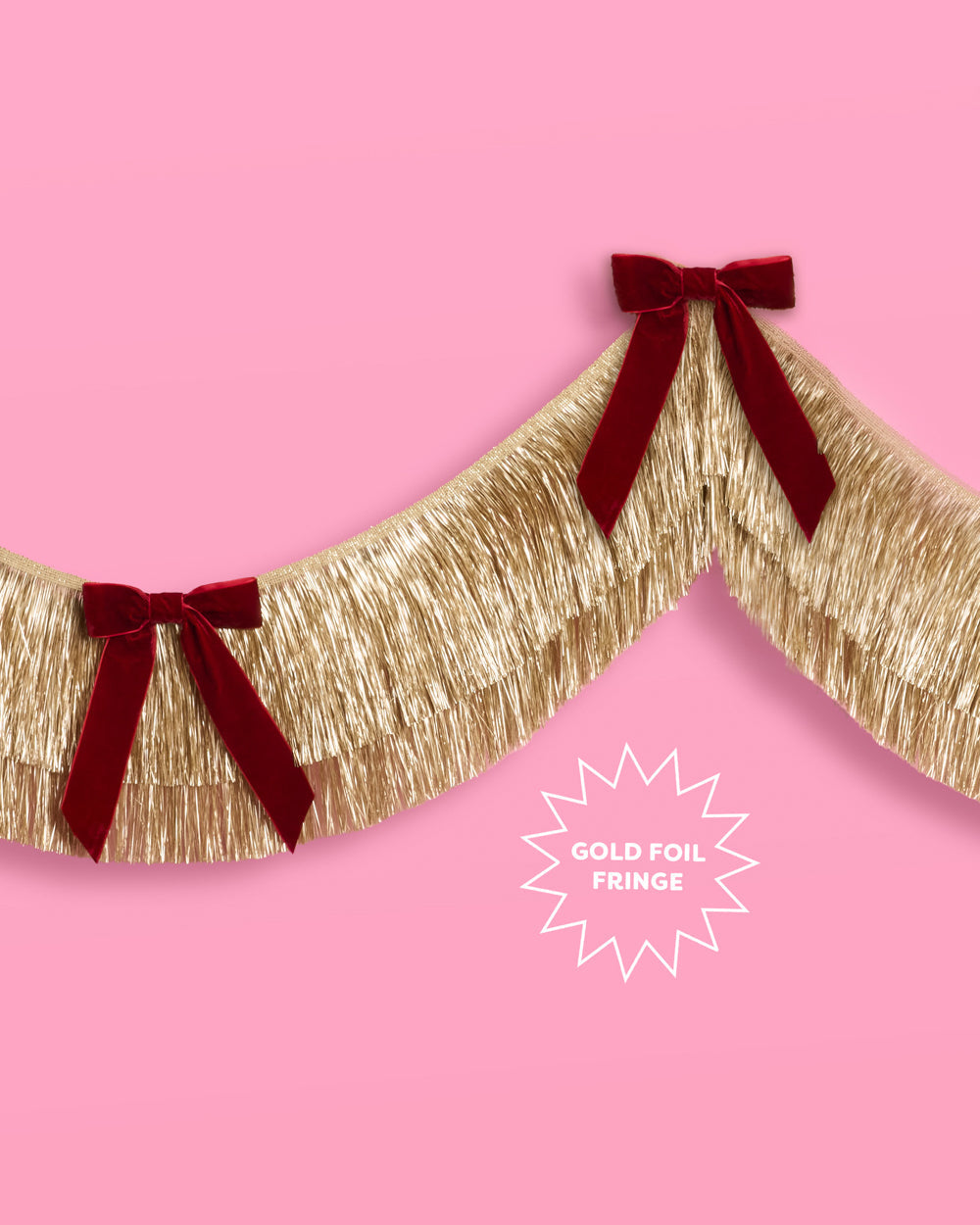 Gold Fringe Backdrop with Burgundy Velvet Bows