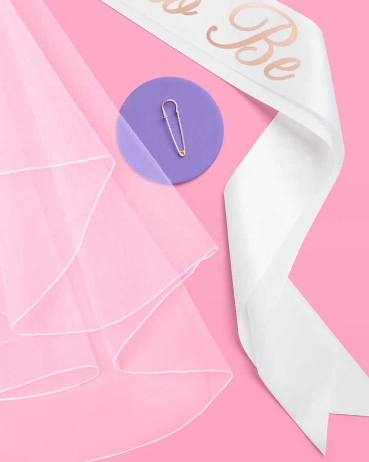 Two-piece bachelorette set including a bride to be sash and a veil