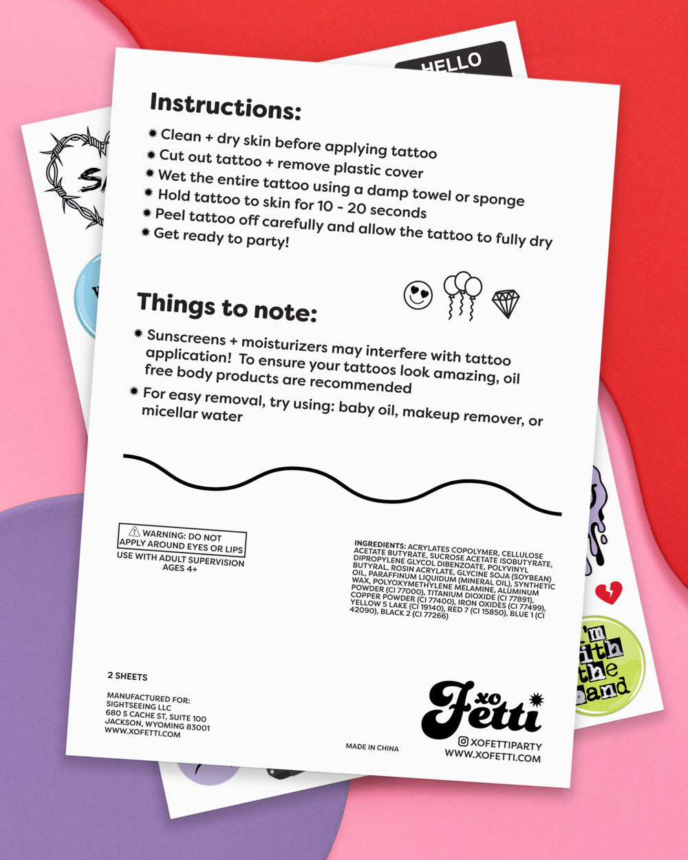 Application instructions card for the emo temporary tattoos on a pink background