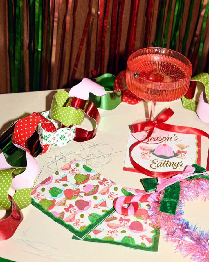 Paper chain strips and craft supplies laid out on a table for a chain making night
