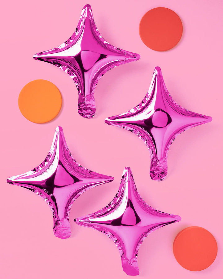 Sparkle foil balloons styled with party decor