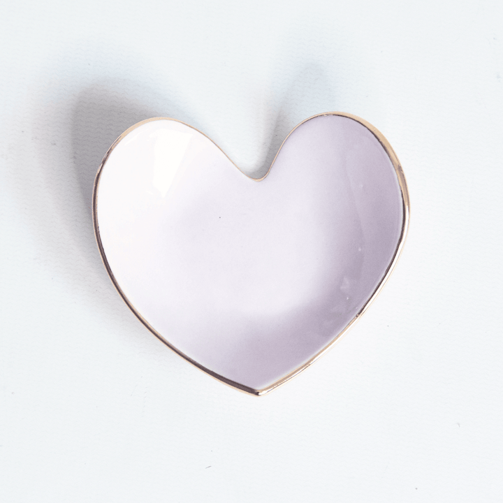 Pale lilac heart ring dish with a gold rim, top view