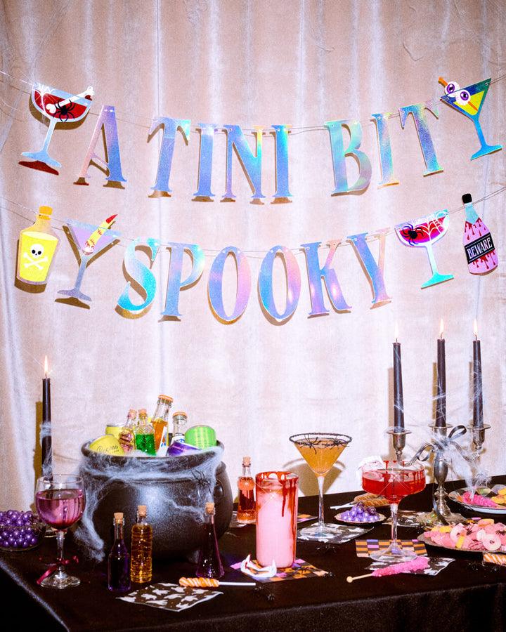 Tini Bit Spooky Banner - 6 ft iridescent banner