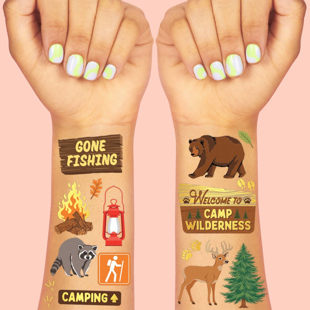 Happy Camper temporary tattoo set by xo Fetti with deer, bears, tents, campfires, and camp wilderness designs, two sheets