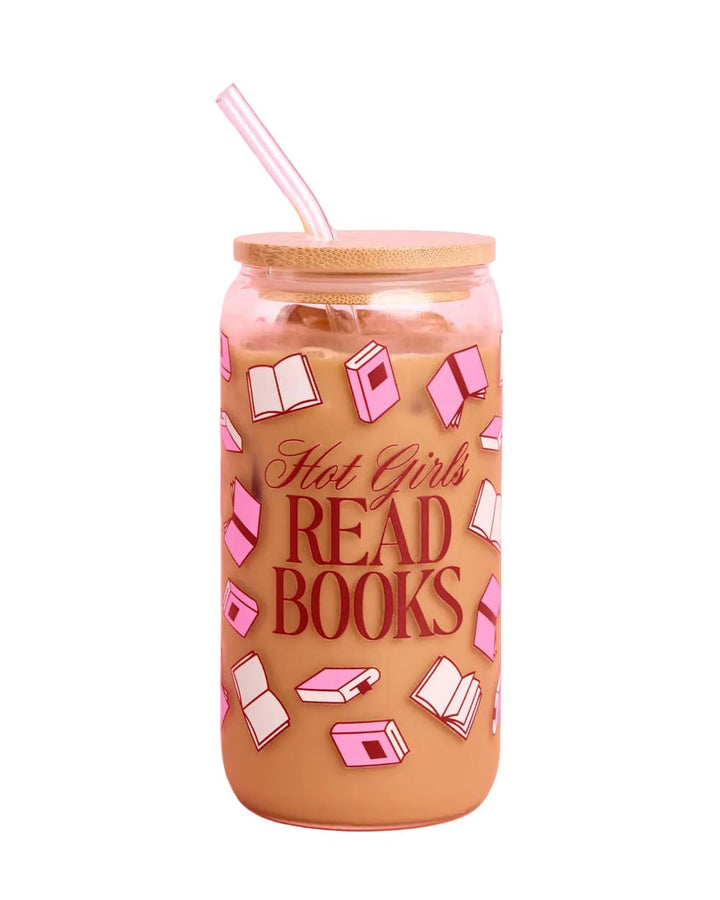 Hot Girls Read Books glass tumbler filled with iced coffee, pink book print, bamboo lid, and glass straw on white
