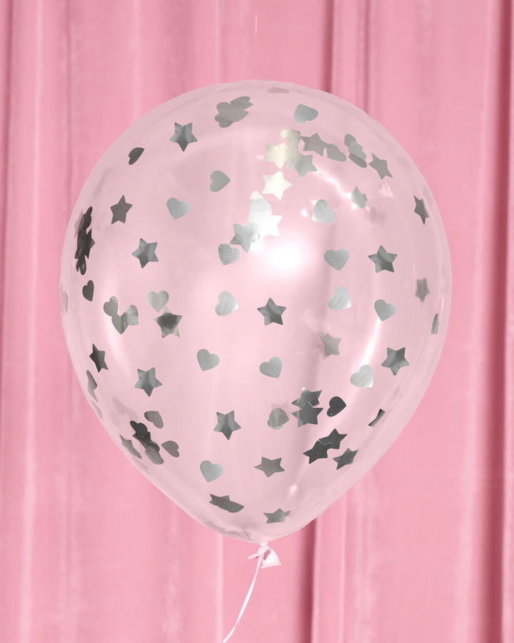 Detail of pastel pink, blue, and purple slumber party latex balloons