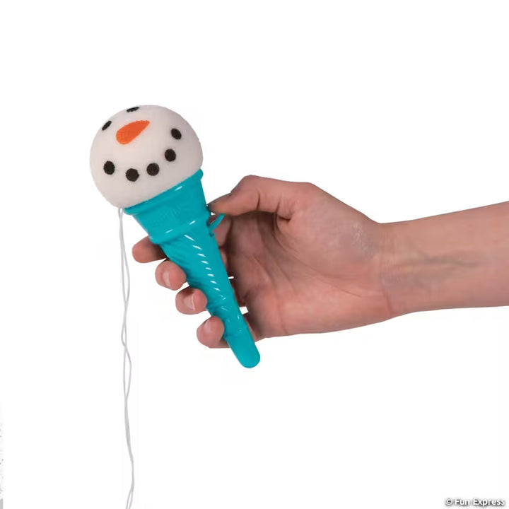 Hand holding a teal ice cream cone shooter topped with a snowman face foam ball, a fun holiday stocking stuffer