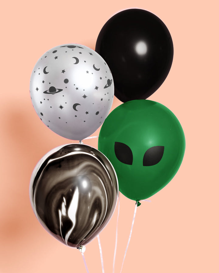 Cluster of space latex balloons: silver star print, black, green alien, and black marble