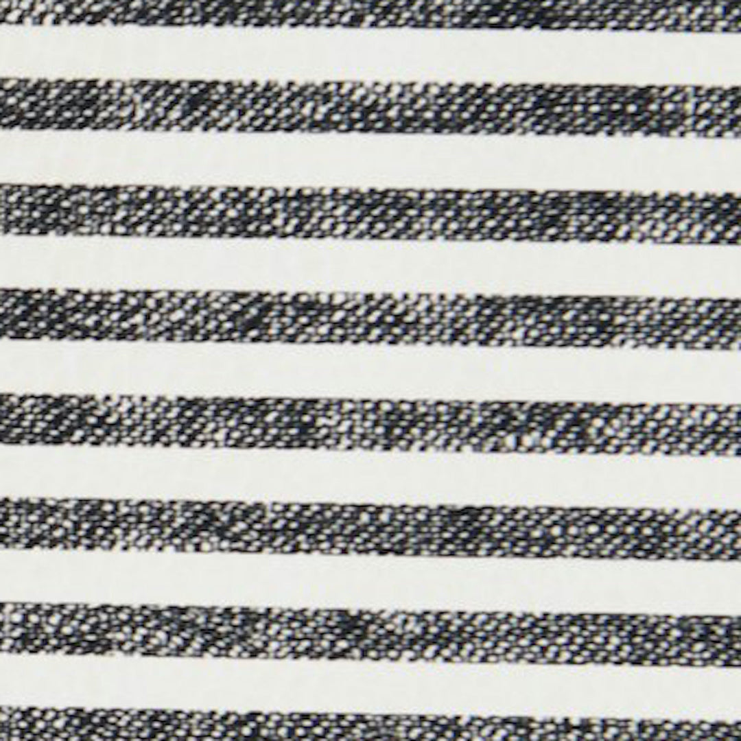 Black and white stripe padded baby play mat, close-up of the patterned swatch.