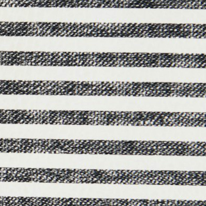 Black and white stripe padded baby play mat, close-up of the patterned swatch.