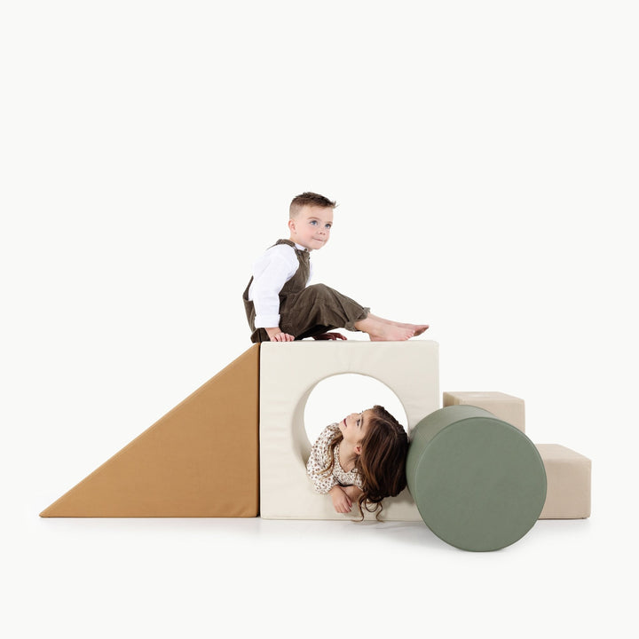 Gathre block playset with foam steps, a cube, and a triangle ramp in cream London print and rust