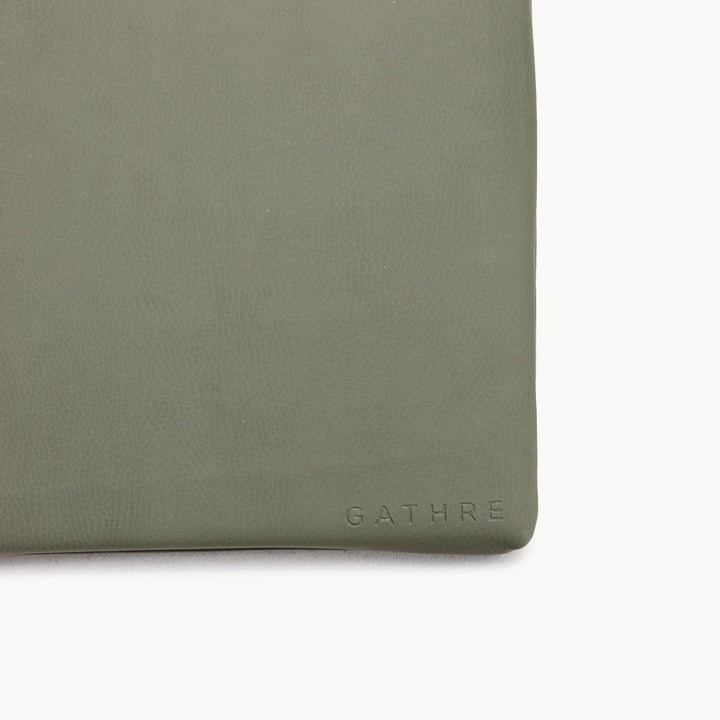 Gathre portable baby play mat with a cushioned memory foam center.
