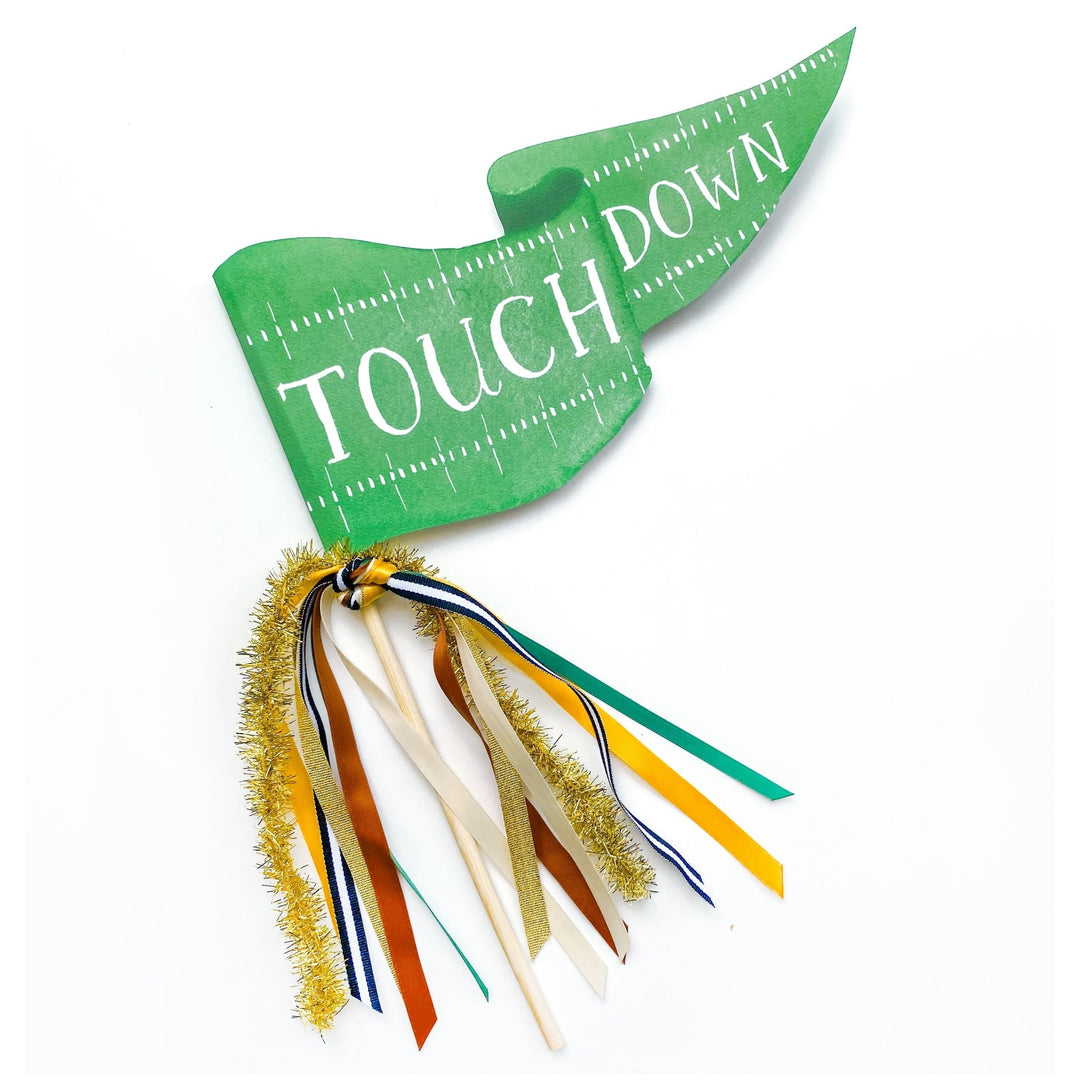 Green football-field Touchdown pennant flag with green, navy, gold, and cream ribbons on a wood dowel