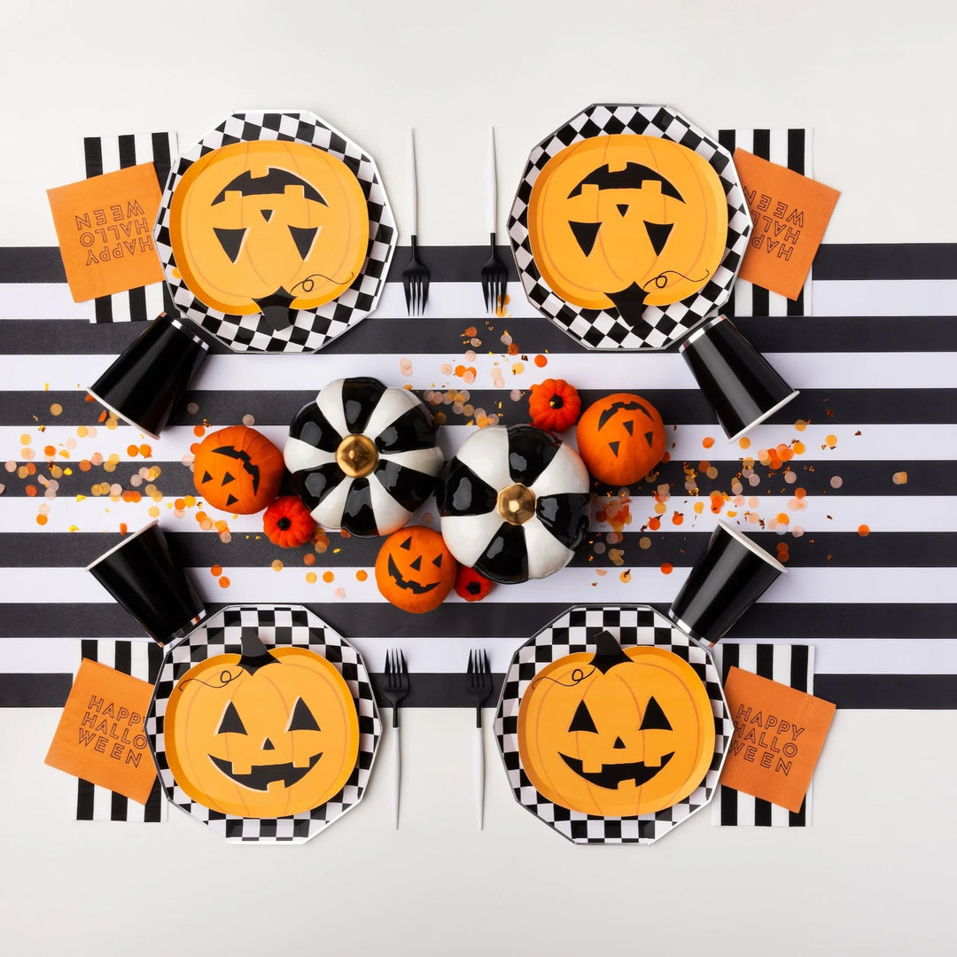 Classic orange and black Halloween party supplies for a kids' jack-o-lantern Halloween party.
