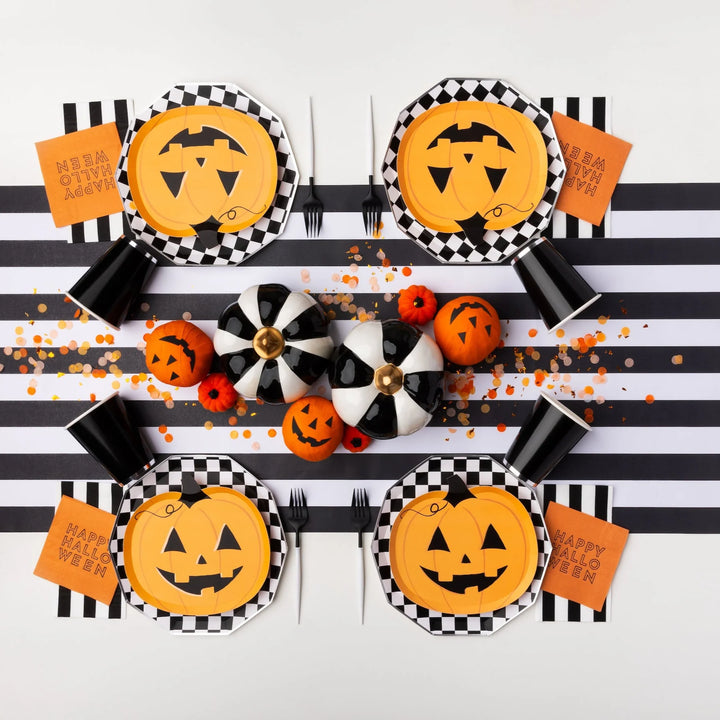 Classic orange and black Halloween party supplies for a kids' jack-o-lantern Halloween party.
