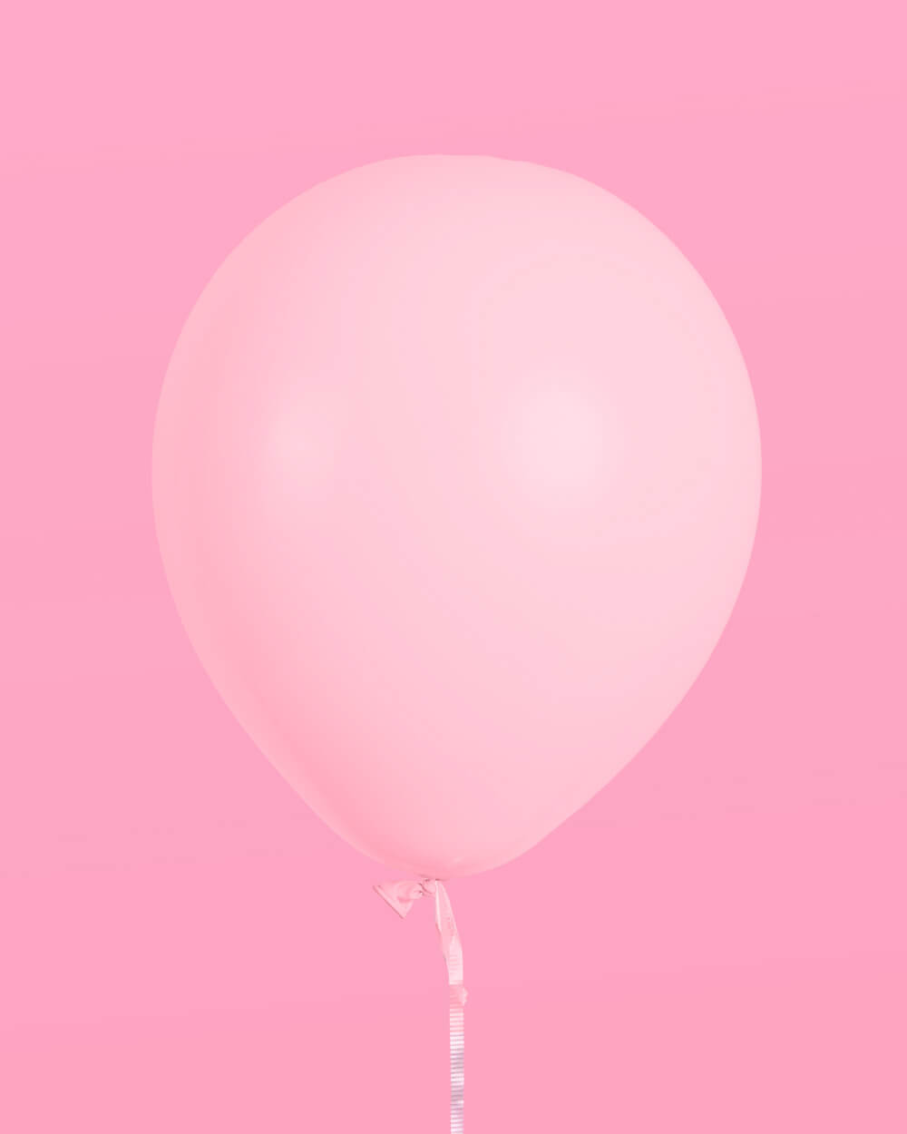 Single solid pink tropical latex balloon