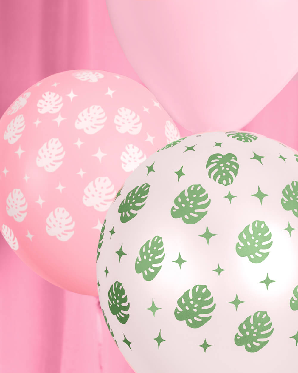 Detail of pink palm print latex balloons