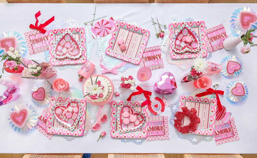 Iridescent silver doily placemats with scalloped edges and heart cutouts, 10 count