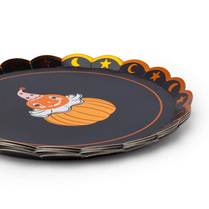 Stack of vintage Halloween character plates showing the retro rim design