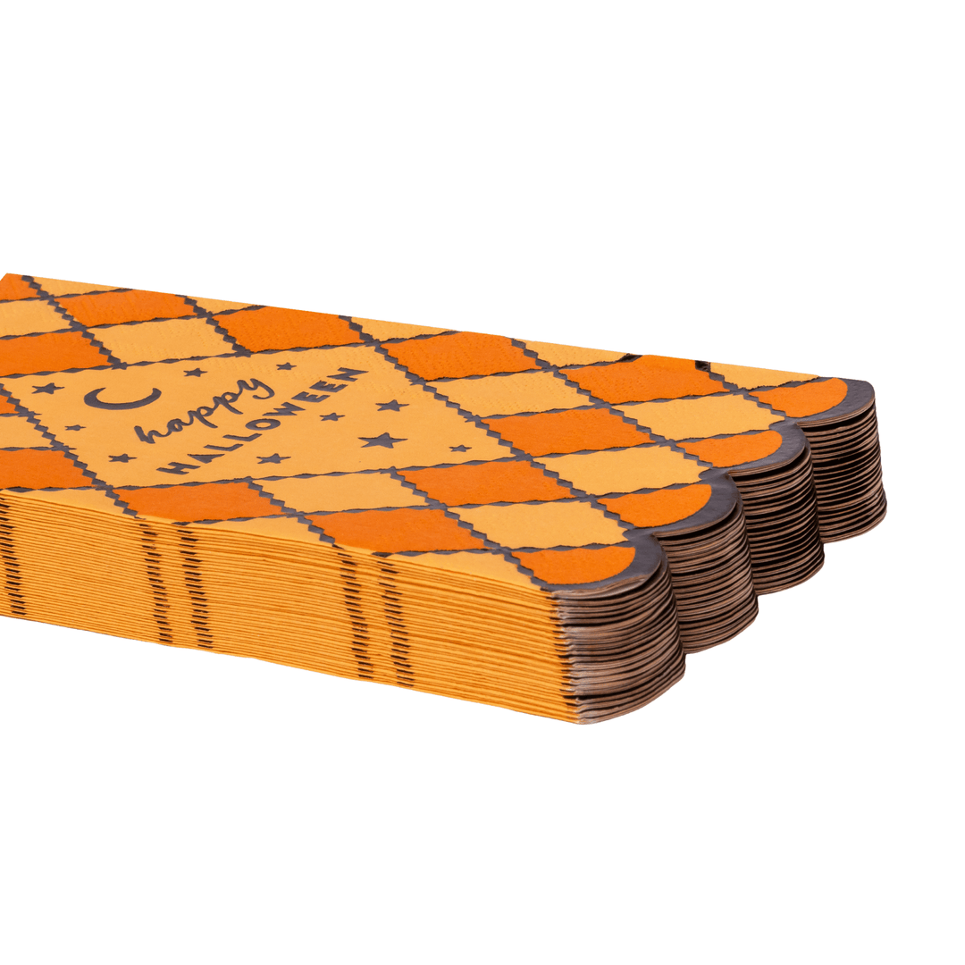 Stack of vintage Halloween guest towels showing the retro print edges
