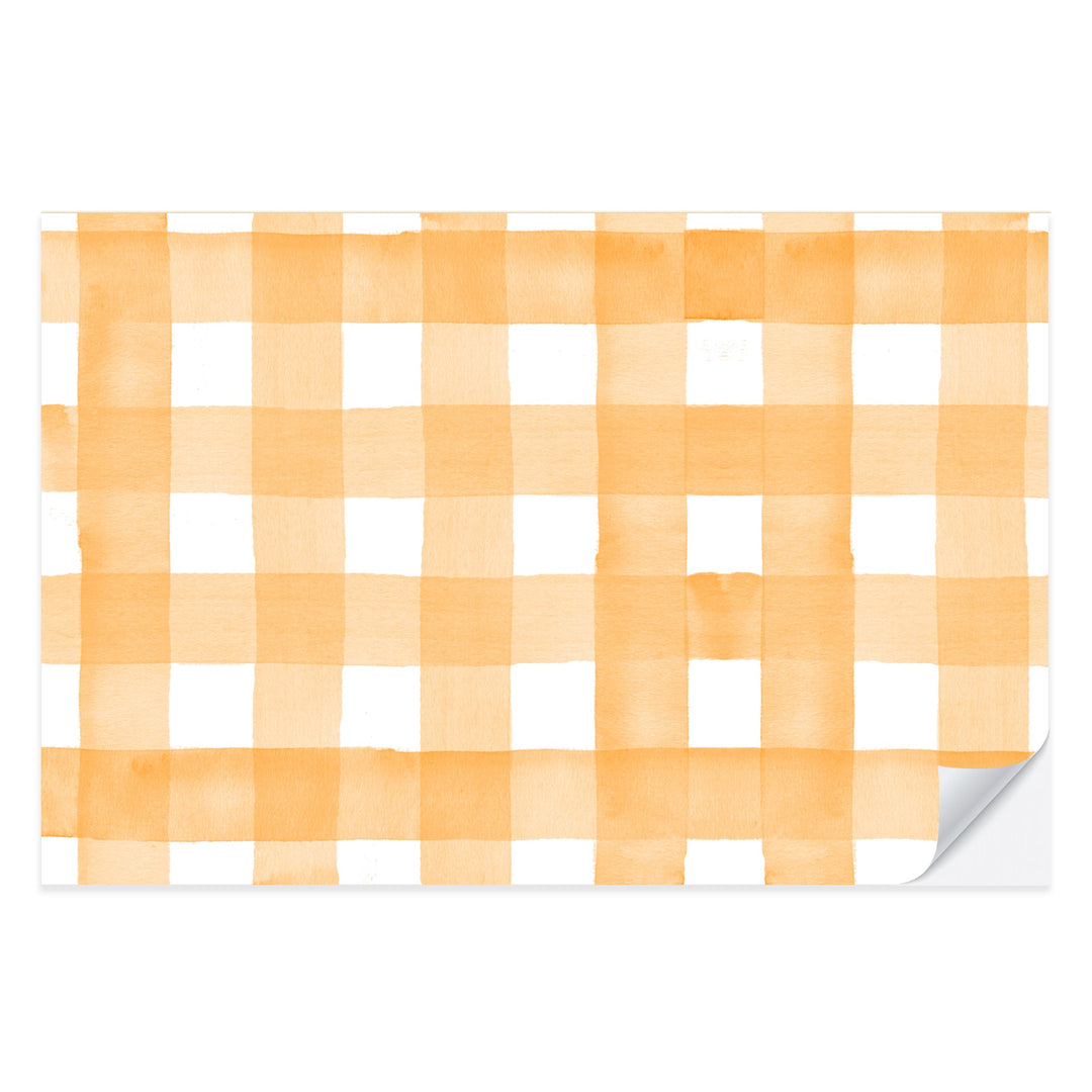 Orange and white watercolor gingham check paper placemat from a tear-off pad of 25