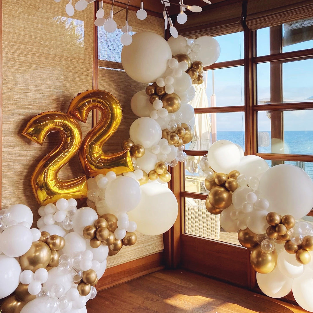 White and gold balloon garland with number balloons Birthday party balloon decoration ideas - Los Angeles balloon installation