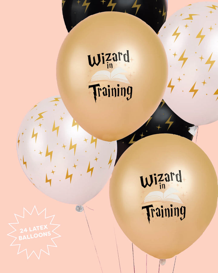 Detail of black and gold wizard latex balloons with lightning bolt print