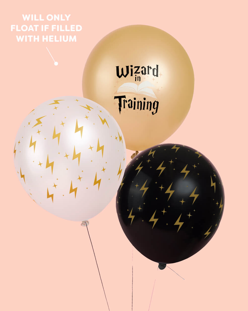 Close-up of white and gold wizard latex balloons with gold lightning bolts