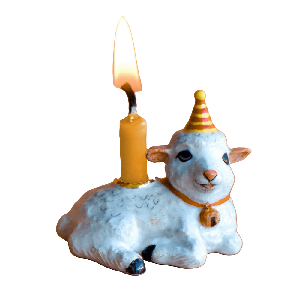 Goat cake topper candle holder in a striped party hat, a Year of the Goat Chinese zodiac keepsake