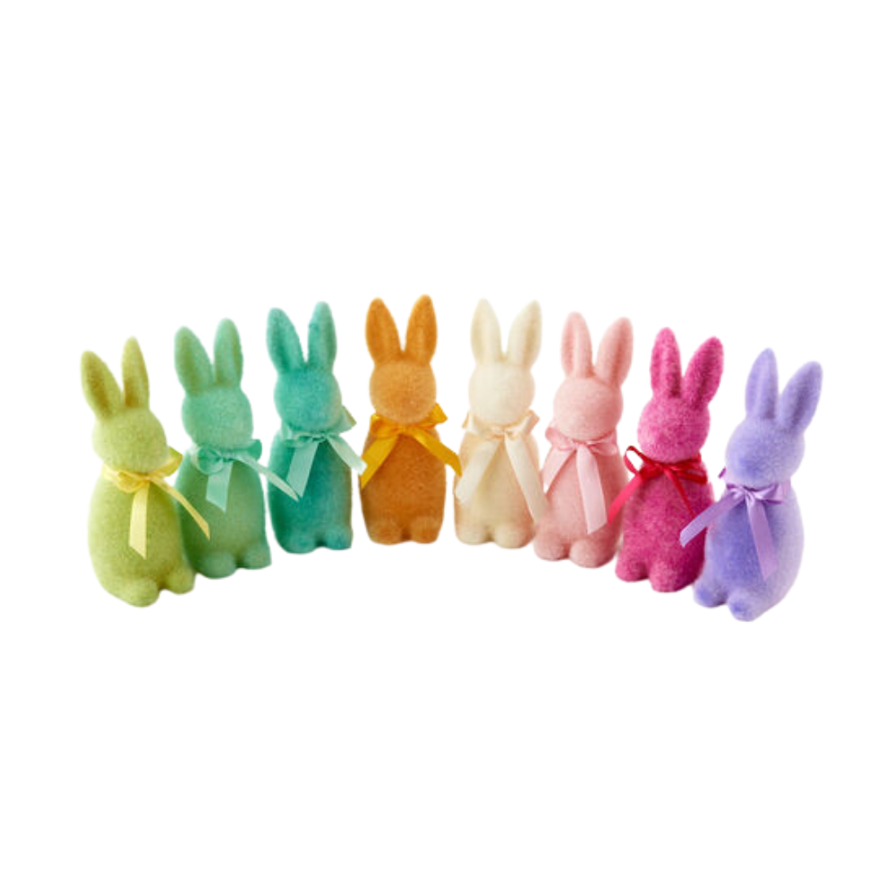 Rainbow flocked bunny decorations, flocked bunnies, and flocked Easter bunnies at Bonjour Fête.